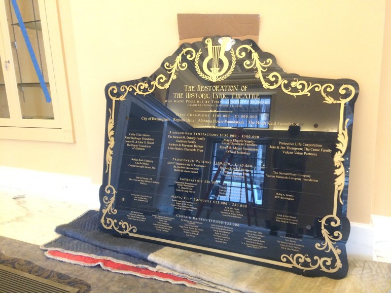 A sign honoring the patrons who donated to the theaters $11.5 million restoration waits to be hung in the lobby. 