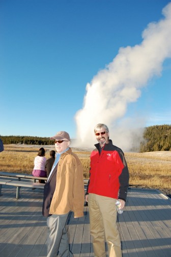 Christopher Hitchens (left) with Larry Taunton near Old Faithful at Yellowstone National Park in October 2015. It was one of two road trips they took before Hitchens died of esophageal cancer in December 2011.