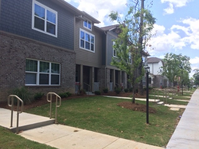 The front of Wood Station homes. Most are two-story, two and three bedroom homes.