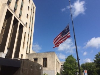 The flag at City Hall was already flying at half-mast honoring the victims of the Orlando nightclub shooting that happened almost a month ago. 