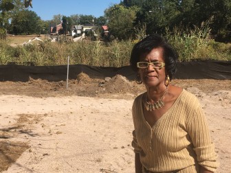 Doris Smith, a lifelong Ensley resident, stands near an area along Village Creek that is being redeveloped.