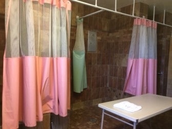 Some of the showers in the dorms at Tutwiler have been remodeled to include updated tile and shower curtains for privacy. 