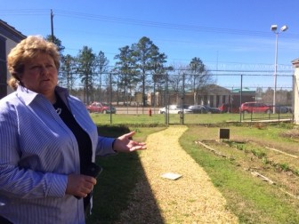 Wendy Williams is Deputy Commissioner for Women's Services for the Alabama Department of Corrections. She oversees the reforms taking place at Tutwiler. Here she stands in the small garden where inmates can grow flowers and other plants.  
