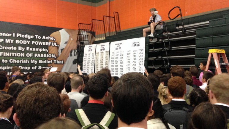 Students crowd the gym at Huffman High School to see if they advanced beyond the preliminary rounds.