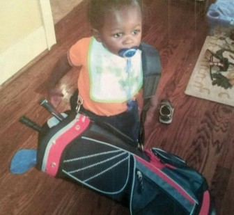 Jerrell Anthony at about 18 months-old with his little set of golf clubs. His parents knew he was destined for golf greatness.