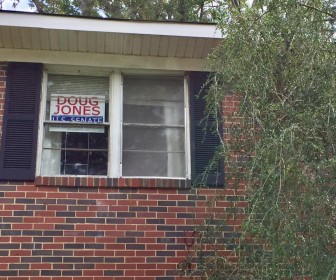 Some Homewood residents like Lindsay Warren have resorted to posting their signs in the window to avoid thefts. 