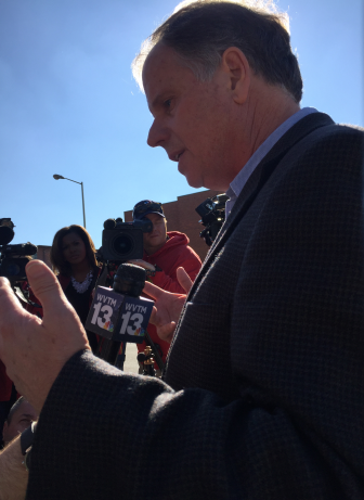 Doug Jones answers questions from local and national reporters Tuesday.