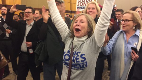 Supporters of Democrat Doug Jones celebrate his victory over GOP opponent Roy Moore.