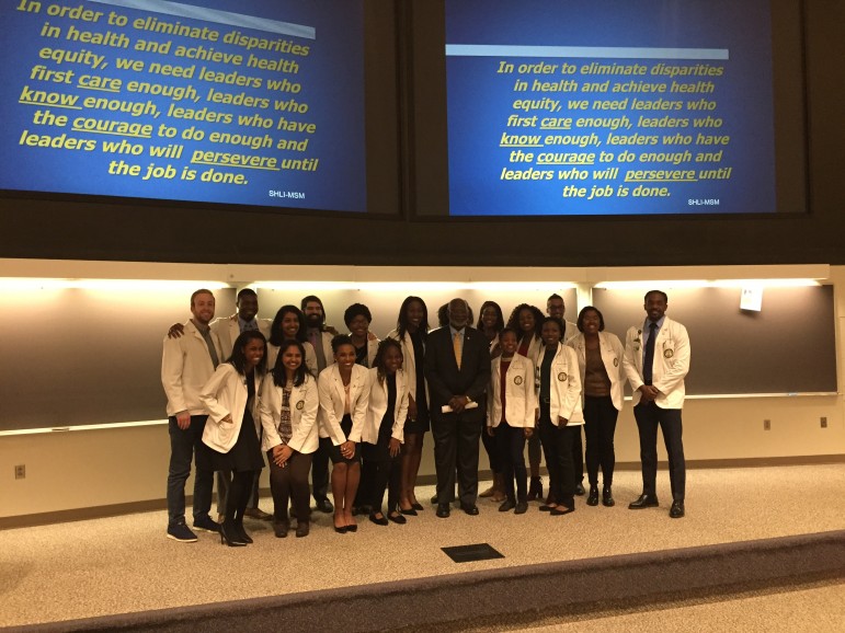 Group shot with a role model: members of the Student National Medical Association's Birmingham branch pose with David Satcher at UAB.