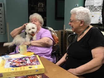 Lorain DeVito (on left) and Marcia Nelson (on right) with "Frances" the dog.